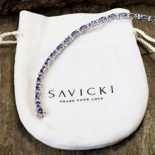 Bransoletka tenisowa SAVICKI: białe złoto, tanzanity, diamenty